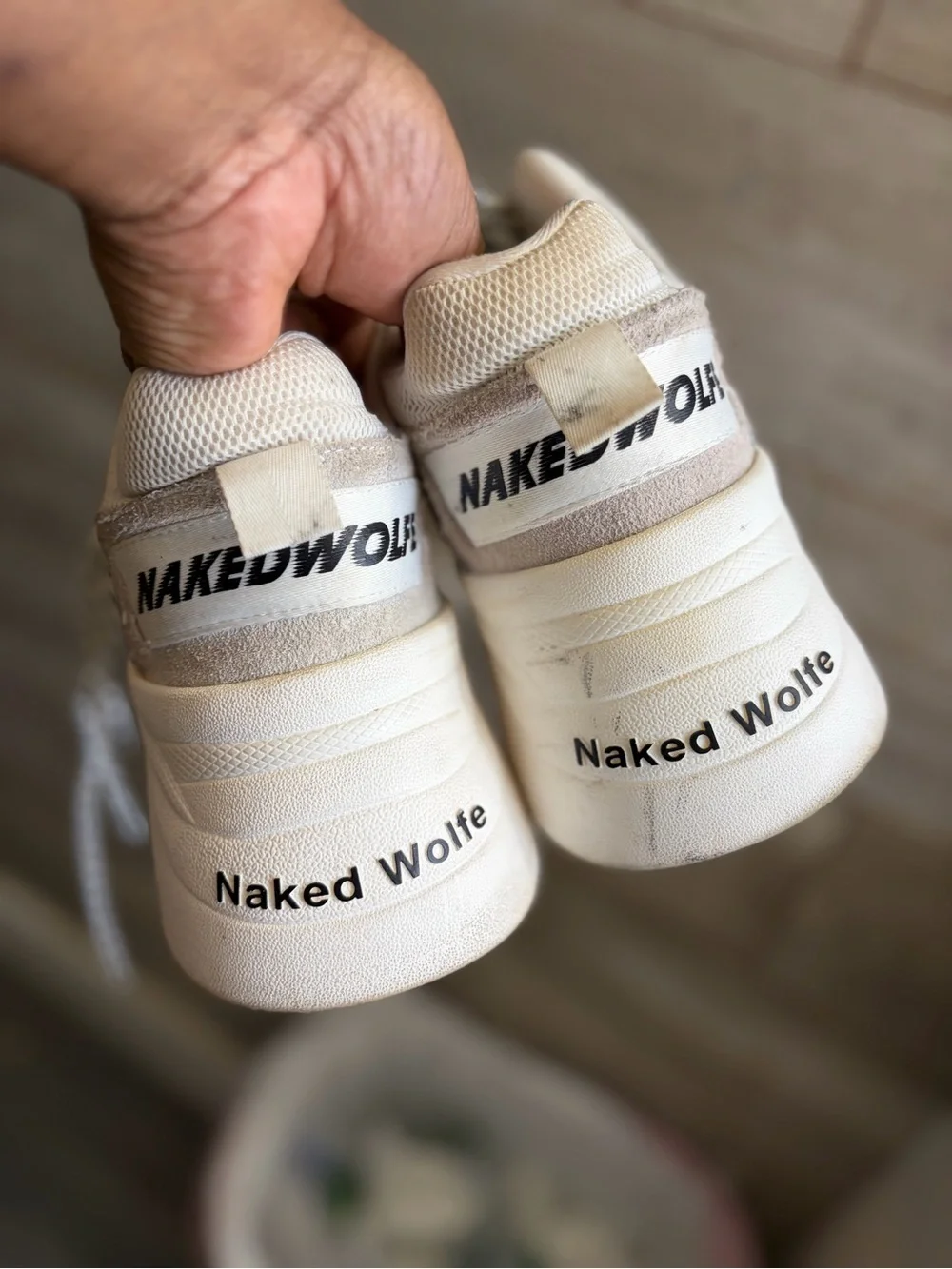 Naked Wolfe Track flatform sneakers w/ a chunky platform sole &- brand lettering